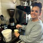 Sequim Gazette photo by Matthew Nash/ Tonya Wright, manager for Hardys Market, makes an espresso for a customer last week.