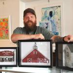 Sequim Gazette photo by Matthew Nash 
Michael Clark of Rural Impressions sells some of his dioramas of local scenes at the Blue Whole Gallery, including the Carlsborg Store, Big Red Barn Farm, and the Knutsen farmhouse.