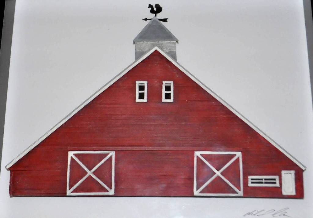 Sequim Gazette photo by Matthew Nash/ The Big Red Barn Farm is one of about 15 scenes Michael Clark has created.