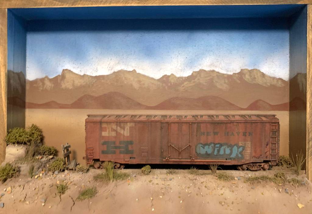 Photo courtesy Michael Clark/ Prior to starting his Rural Impressions diorama art business, Michael Clark said he tinkered around with scenes for models first, such as this railcar with handpainted graffiti on it.